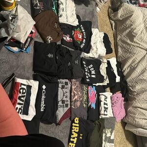 32 small- medium designer shirts